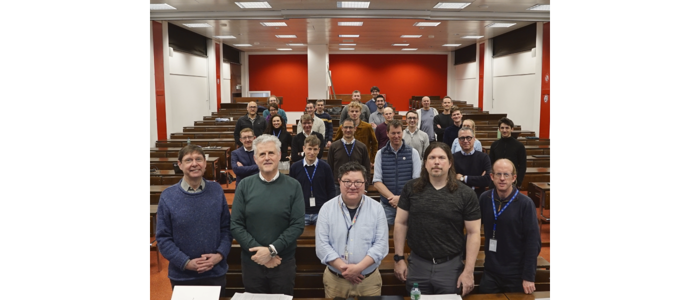 people smiling in lecture theatre