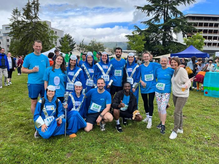 running teams standing in the rain